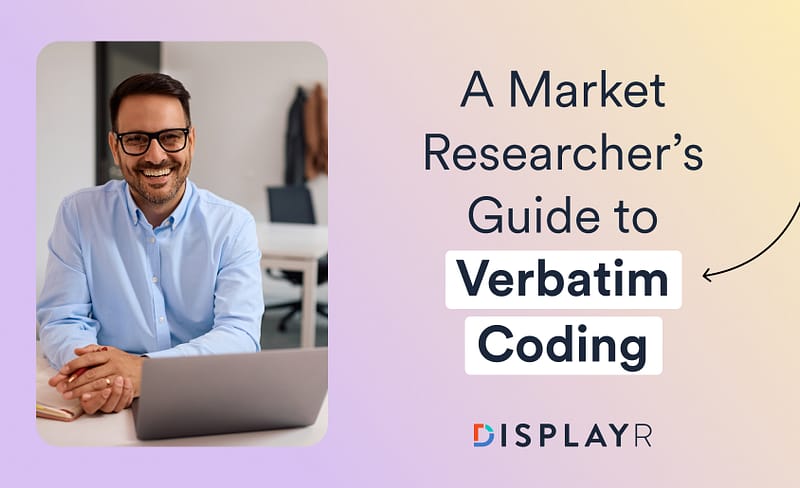 A man sitting with a laptop next to text.